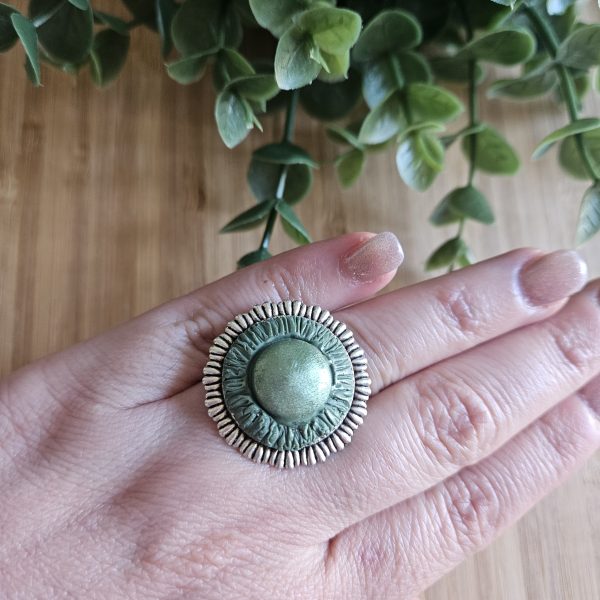 Green shimmery round ring